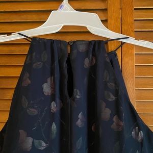 Beautiful dress in dark blue with flowers pink. Very elegant.